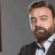 "هددوني بابني".. سامر المصري يروي تفاصيل لقائه مع بشار الأسد (فيديو)