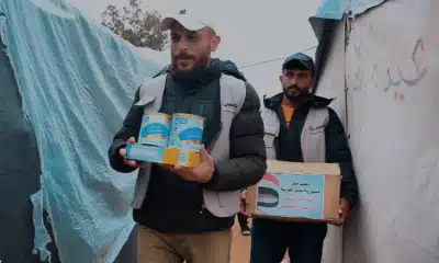 اللجنة المصرية توزع حليب الأطفال فى قطاع غزة
