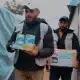 اللجنة المصرية توزع حليب الأطفال فى قطاع غزة